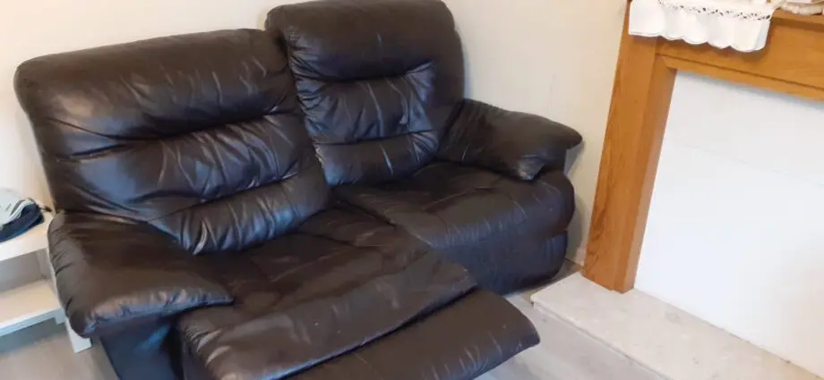 Black colour recliner sofa