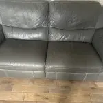 DFS large two seater leather recliner sofa