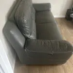 DFS large two seater leather recliner sofa