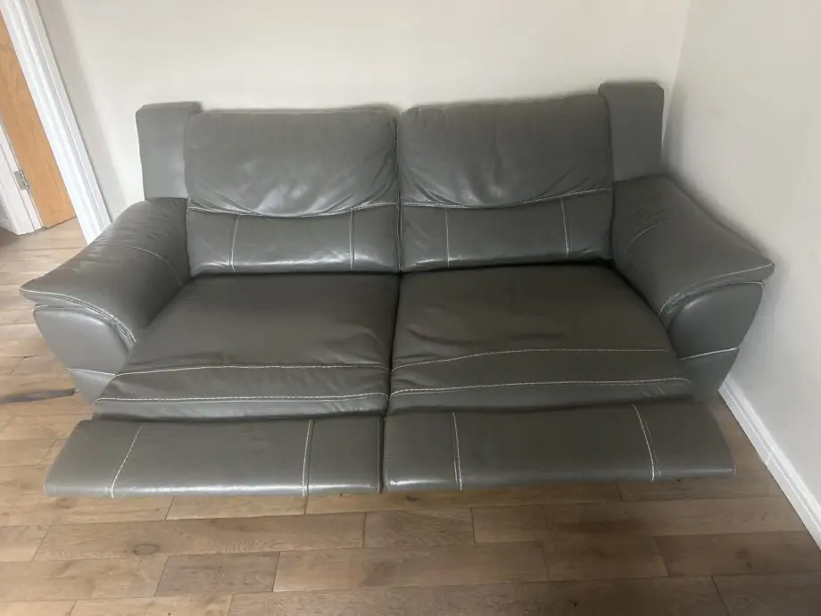 DFS large two seater leather recliner sofa