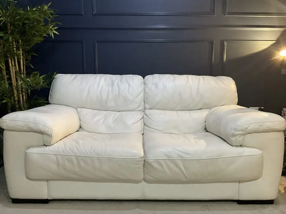 White leather two seater sofa