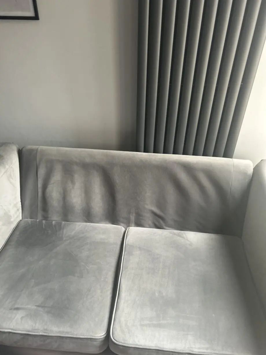 Large grey velvet sofa