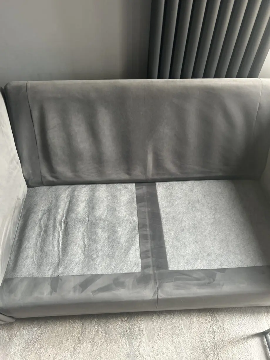 Large grey velvet sofa