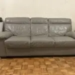 Grey leather 3 seater sofas x2