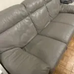 Grey leather 3 seater sofas x2