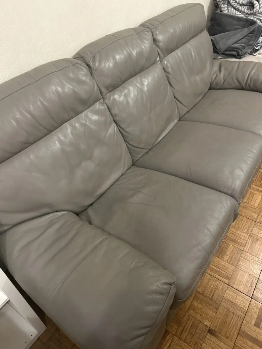 Grey leather 3 seater sofas x2
