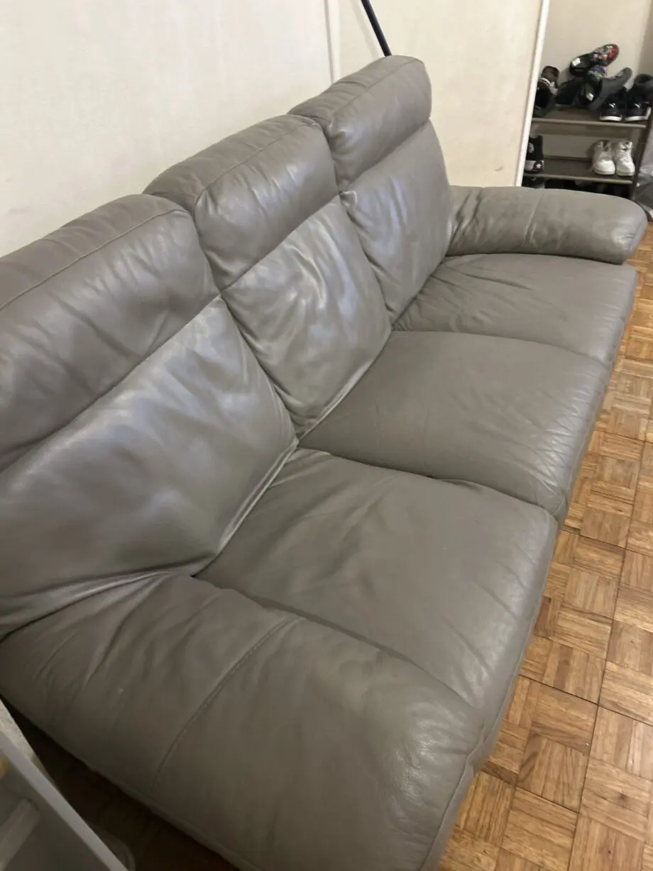 Grey leather 3 seater sofas x2