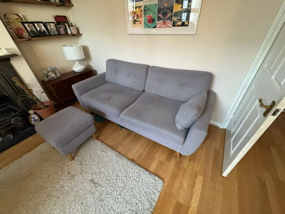 3 Seater grey sofa with cushion