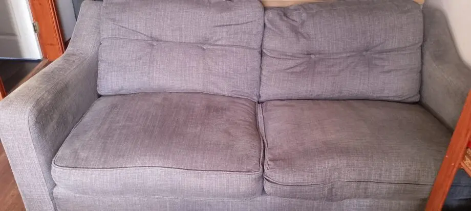 Grey two seater sofa