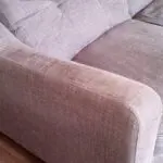 Grey two seater sofa