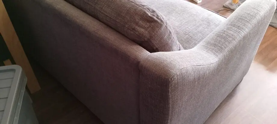 Grey two seater sofa