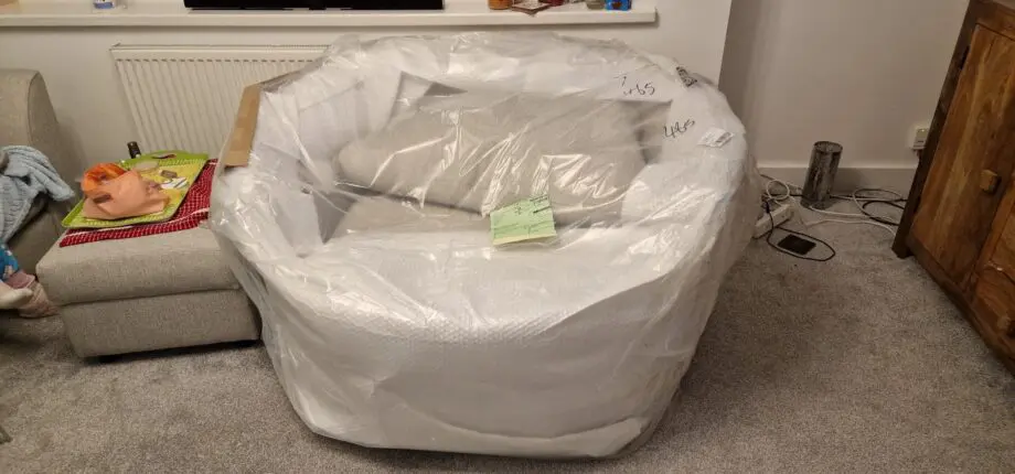 Large greyson swivel chair in light grey