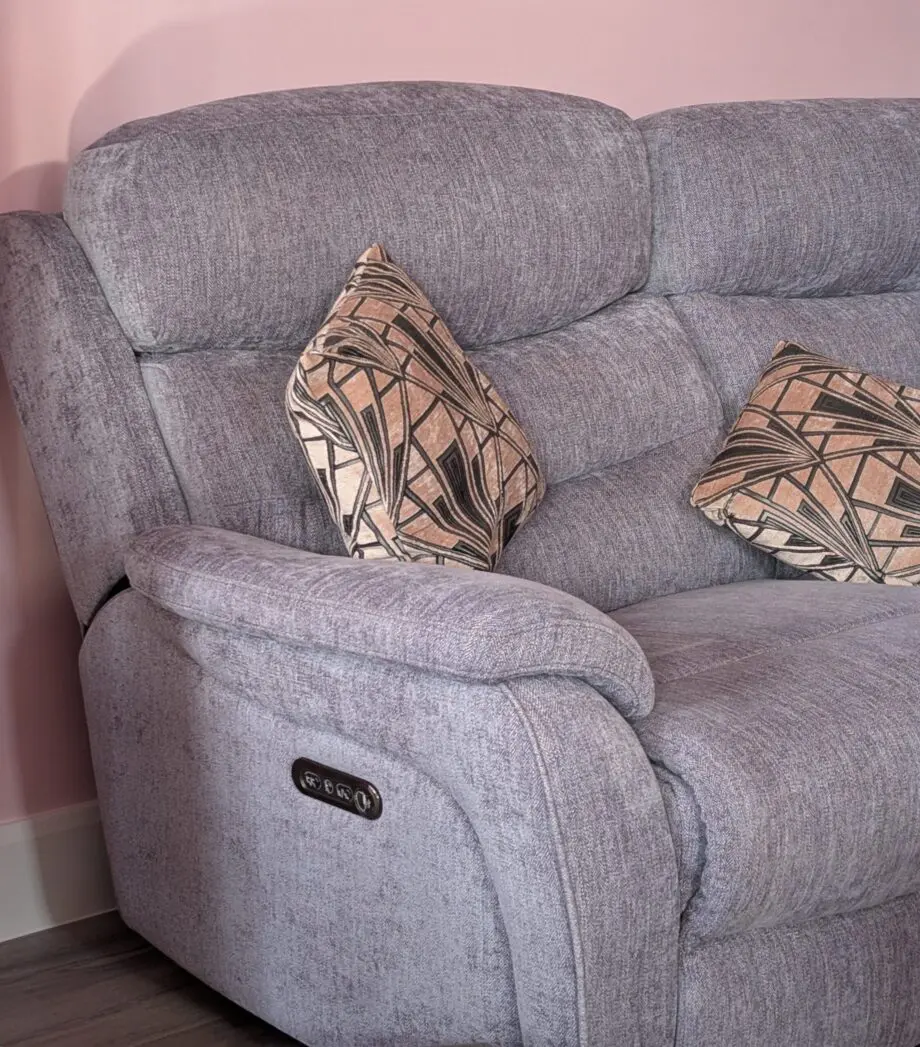 3 piece suite and foot stool from Fabb Furniture. Style is James and colour is lavender grey. Power recliner sofas