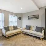Roomes Beige 2 seater sofa