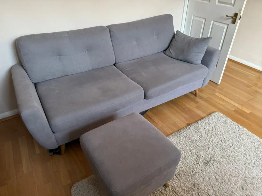 3 Seater grey sofa with cushion