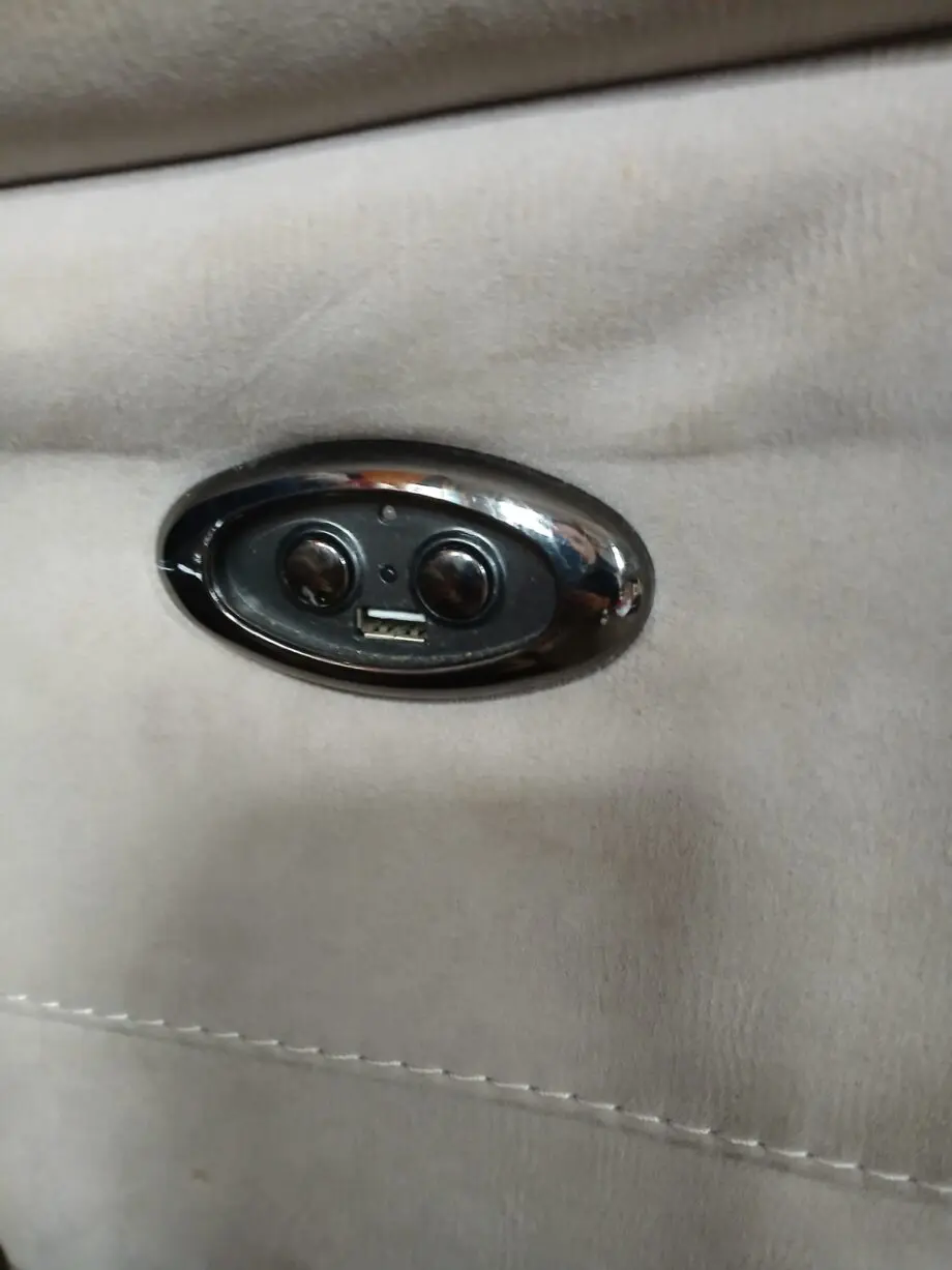Grey suade reclining charging sofa