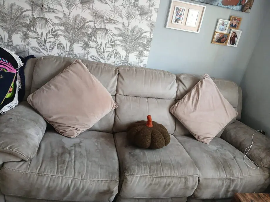 Grey suade reclining charging sofa