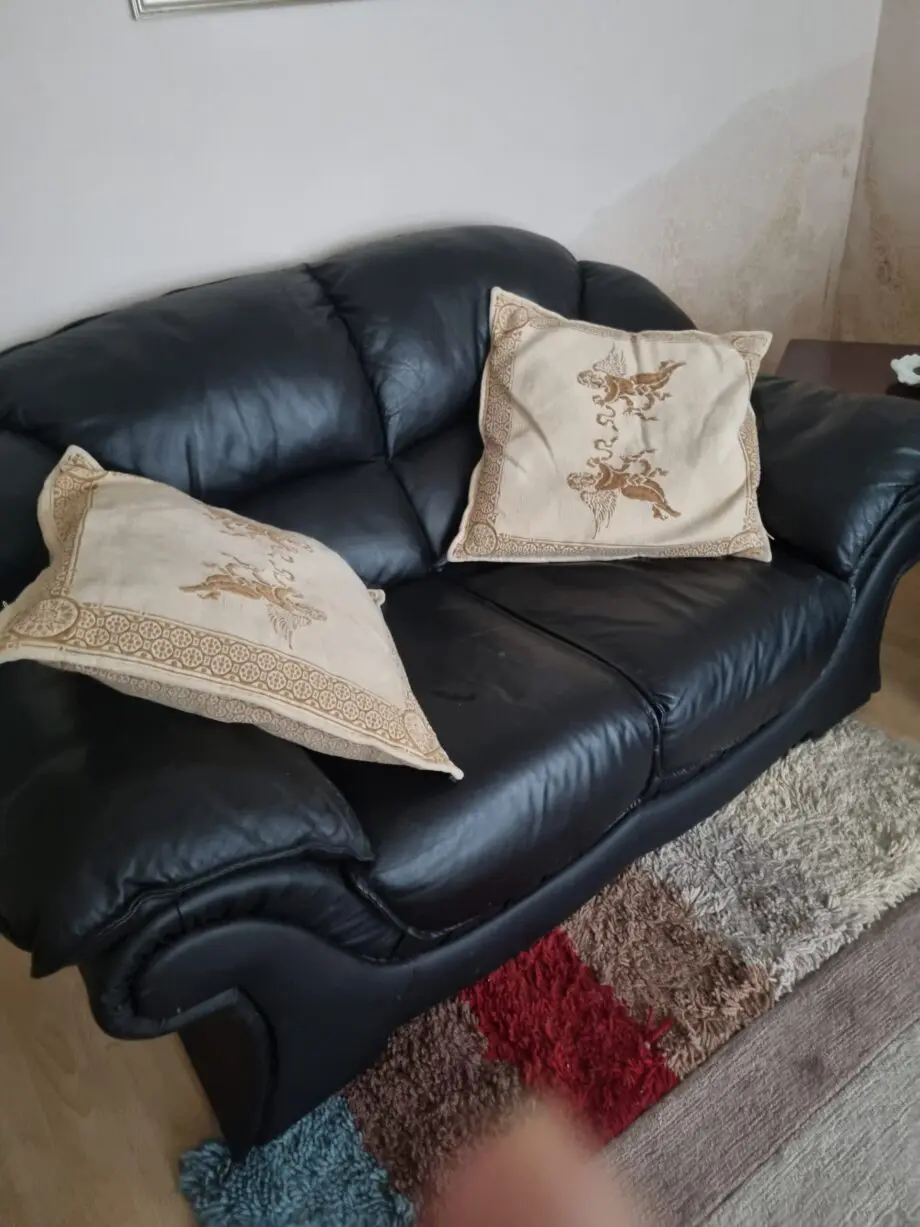 Black leather sofas, lovely condition