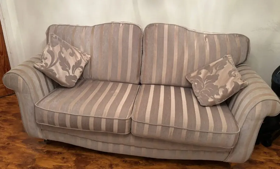 High back gold/grey sofas
