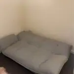 Grey Sofa Bed 3 seater convertible with adjustable armrests