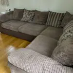 DFS Brown Corner Sofa with footstool