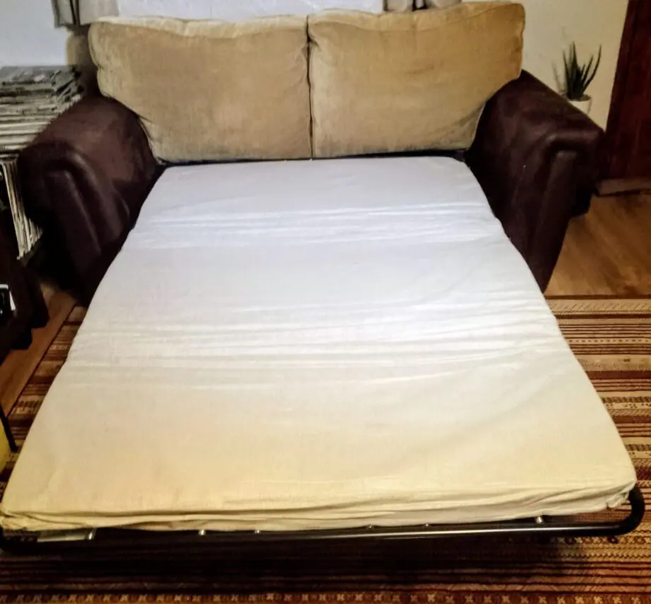 DFS brown faux suede sofa bed