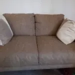 One coffee brown 3seater and one cream 2seater sofas