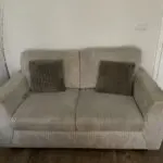 DFS 2 seater sofa and footstool in grey with x2 cushions