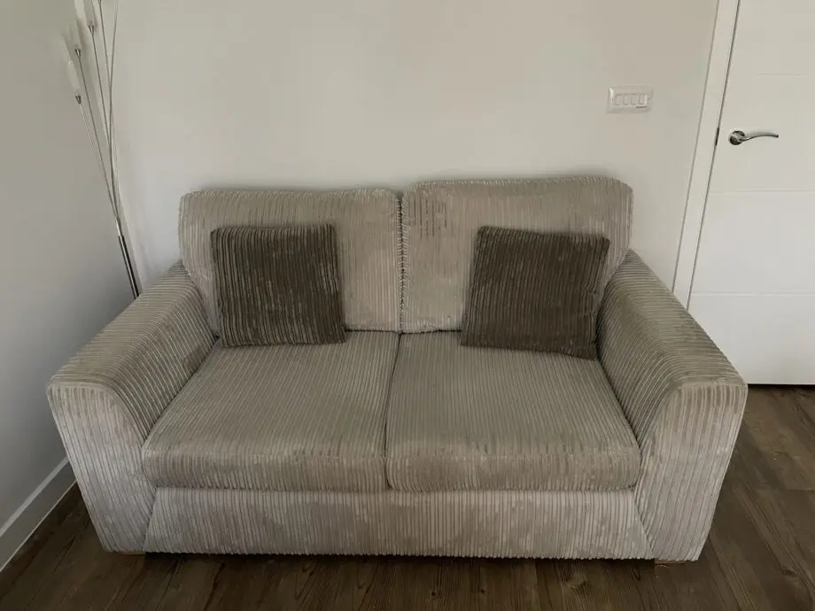 DFS 2 seater sofa and footstool in grey with x2 cushions
