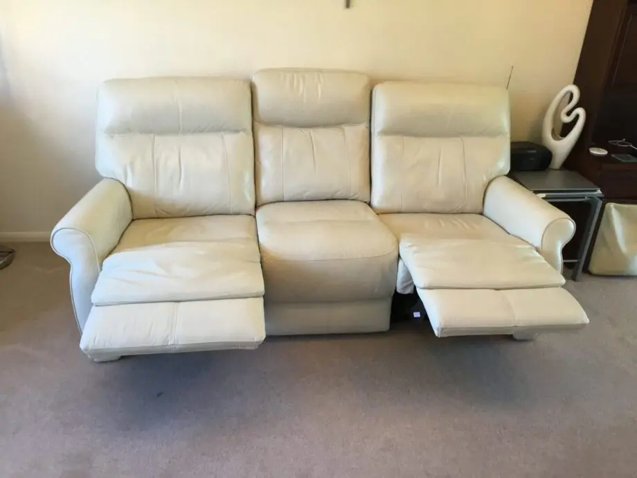 Harvey’s cream leather Brayden 3+2 seater sofas
