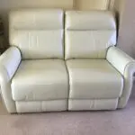 Harvey’s cream leather Brayden 3+2 seater sofas