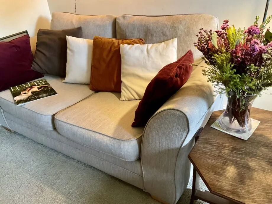 2 Seater beige Sofa bed