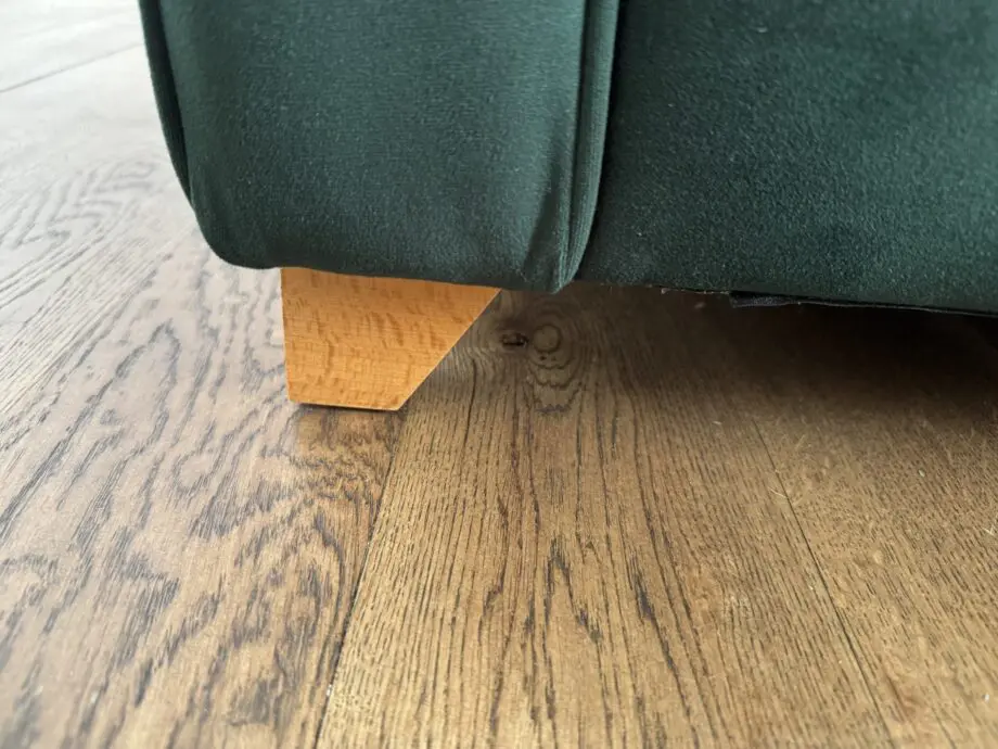 Willow and hall 7 seat Bisford corner sofa in hunter green coloured luxurious velvet. Seat cushions in beautiful soft feather wrapped foam. Removable arms for easier installation.