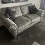 2 x Silver Crushed Velvet Sofas and Footstool. Fishpools Hollywood range.