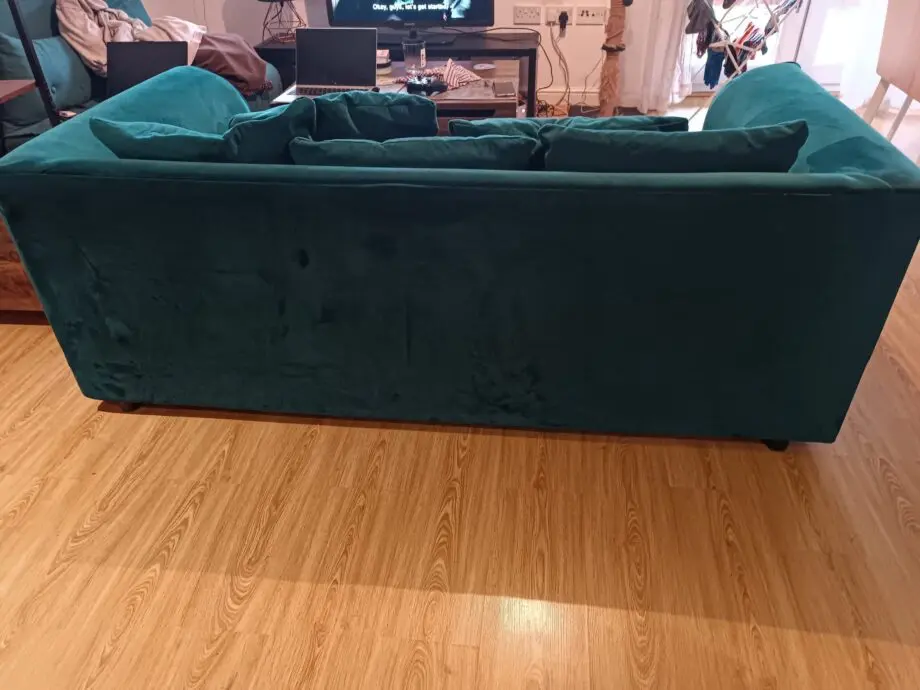 Teal velvet sofa