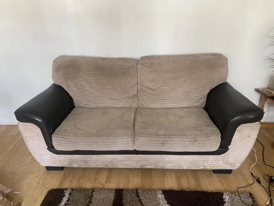 Two brown/beige sofa sets.