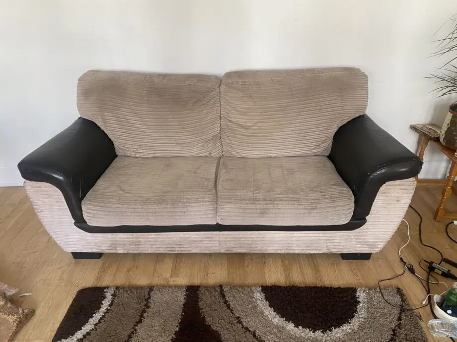 Two brown/beige sofa sets.