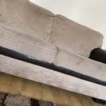 Two brown/beige sofa sets.