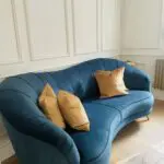 Sofology Perle sofa and armchair in Teal with gold feet