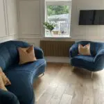 Sofology Perle sofa and armchair in Teal with gold feet