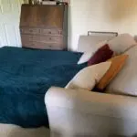 2 Seater beige Sofa bed