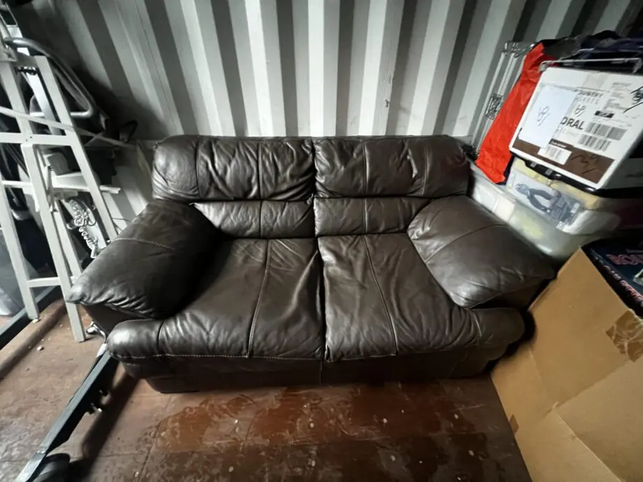 DFS Leather Two-Seater Dark Brown Sofa