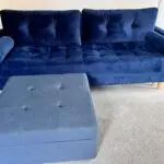 Navy velvet sofa bed with ottoman