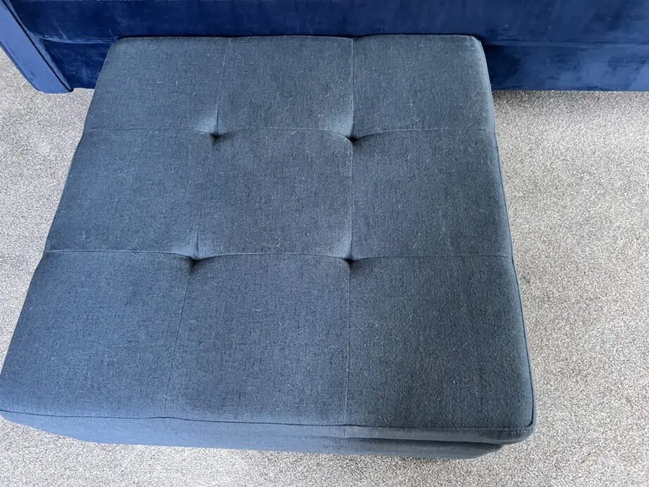 Navy velvet sofa bed with ottoman