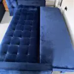 Navy velvet sofa bed with ottoman