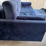 Navy velvet sofa bed with ottoman