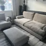 Taupe four seater sofa. armchair and footstool