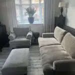 Taupe four seater sofa. armchair and footstool