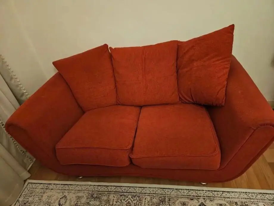 Red, 2 seater Sofa.