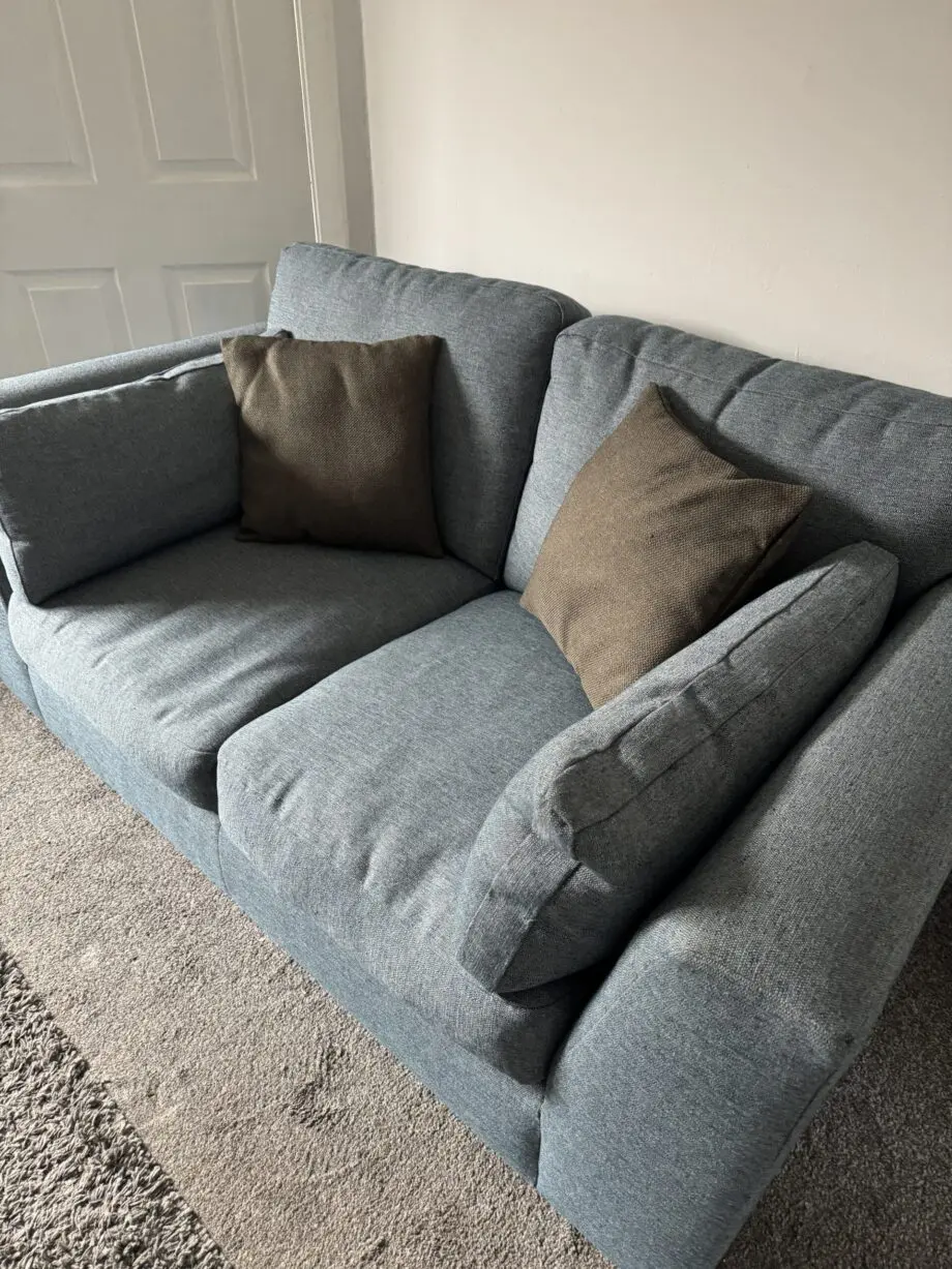 Unused M&S Large 2 seater blue sofa in brand new condition. This is the best quality and best priced sofa on this whole site and is being removed from sale after this final reduction.